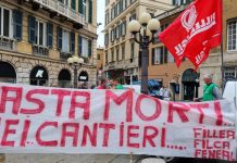 foto striscione basta morti nei cantieri